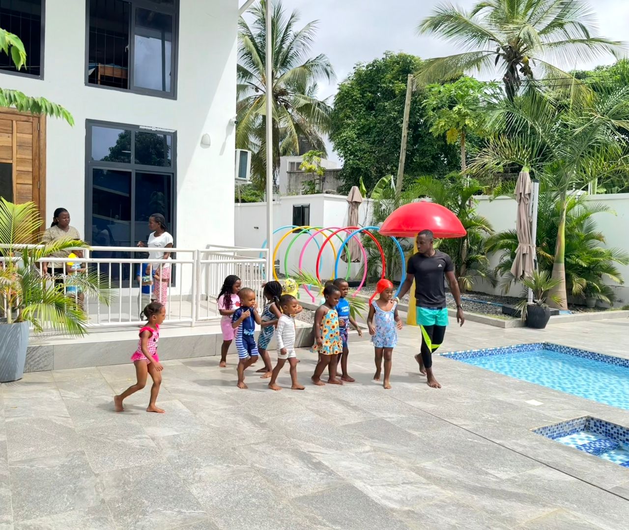 Children Going for Swimming with Coach